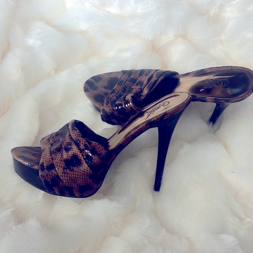New Carlos Santana never worn…Very sexy and cute leopard print. Size 10